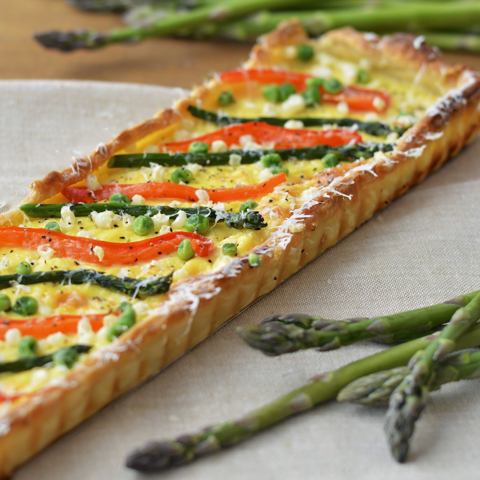 This spring vegetable tart is made with greek yogurt and fresh veggies. It's perfect for dinner with crusty French bread and an arugula salad | Virtually Homemade