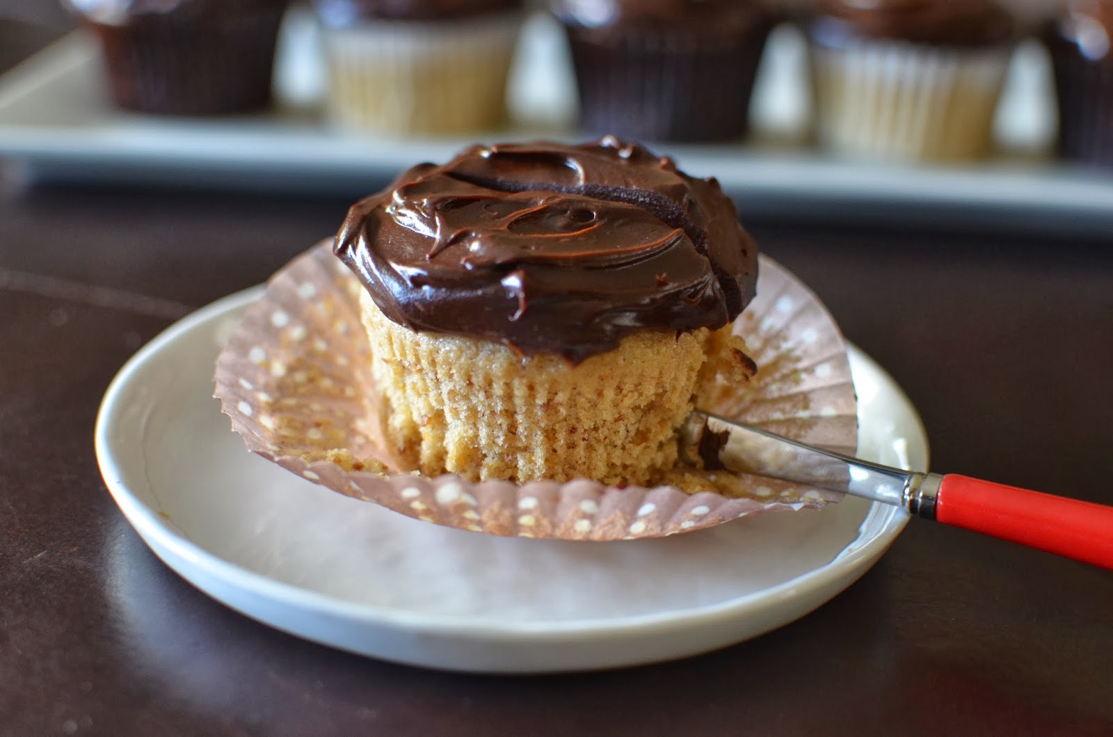 Playing with Flour Almondhazelnut cupcakes with ganache frosting