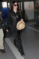 Jennifer Love Hewitt wearing black sunglasses