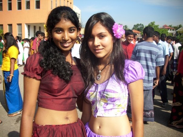 Two sri lankan girls scissoring photos