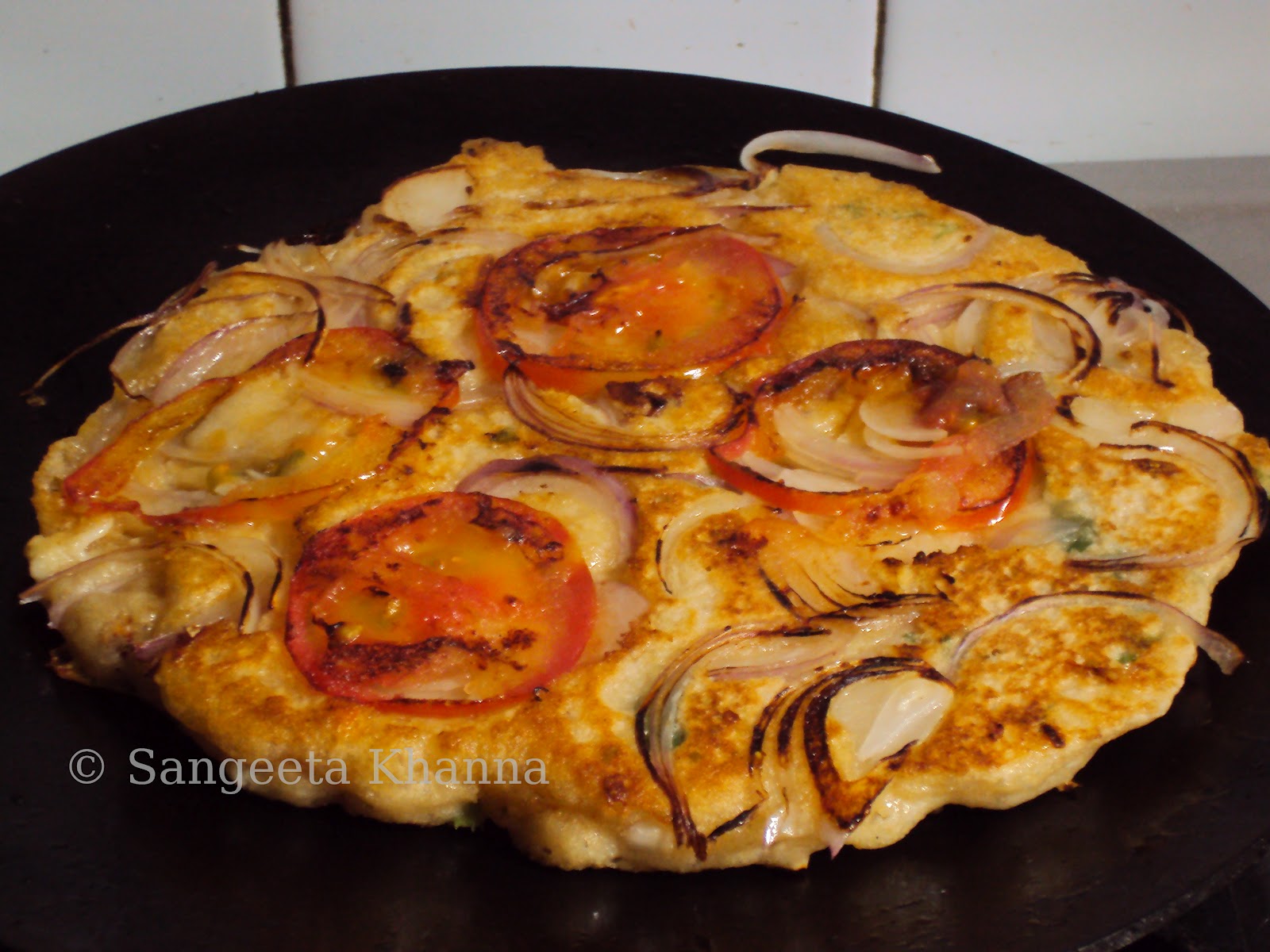 A flatbread made on griddle my improvised focaccia..
