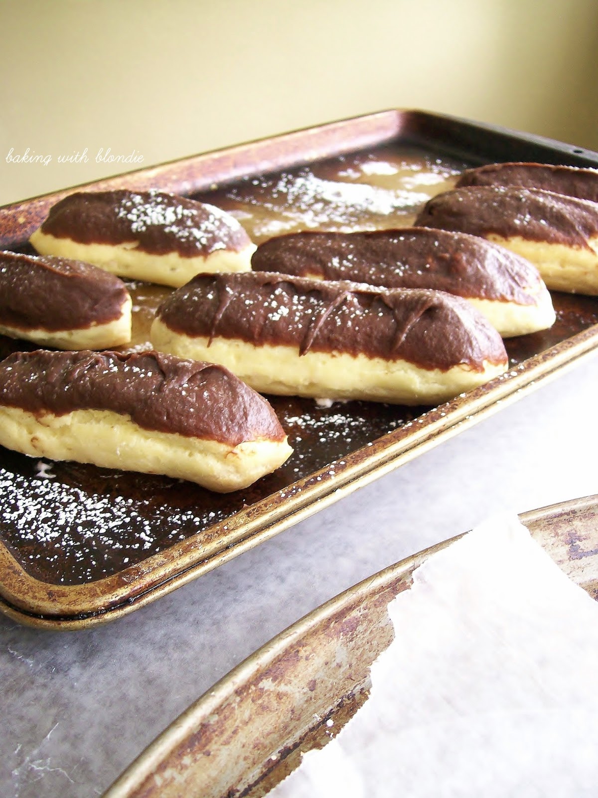 Homemade Strawberry Cream Filled Eclairs with Chocolate Cream Cheese Sauce