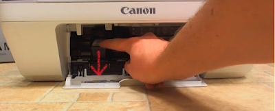 pressing down to remove cartridge pressing down to remove cartridge