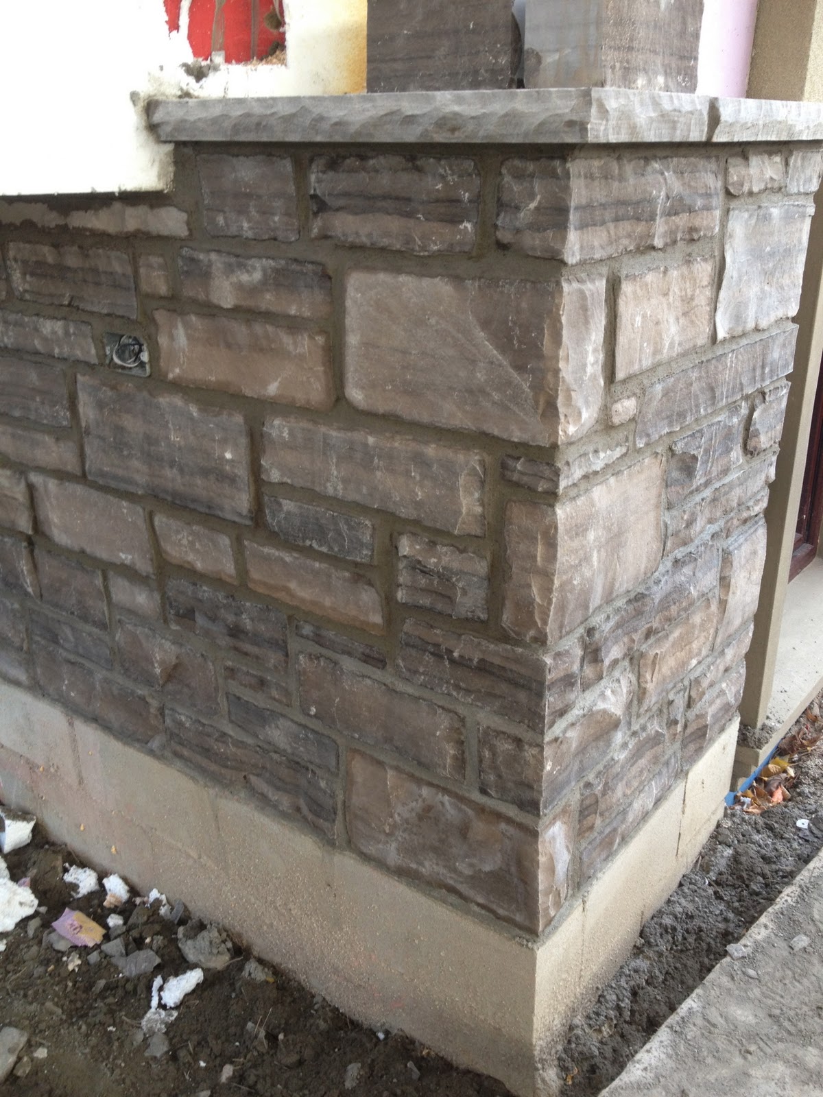 The Reno Coach Passive House Project in Toronto Stone work on Front of