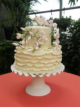 2-tier round fondant frill with gumpaste flowers