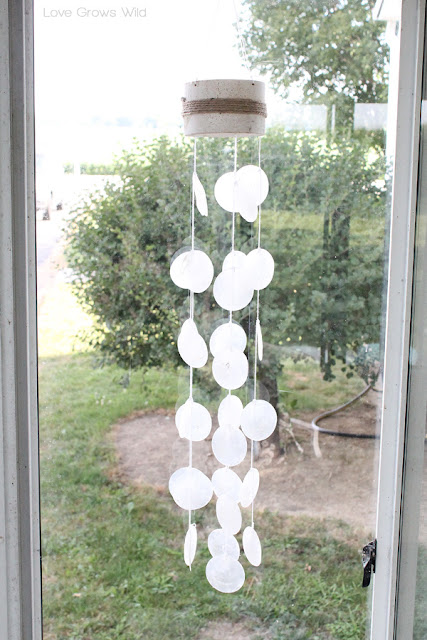 Simple, inexpensive decor to create an inviting outdoor living space! at LoveGrowsWild.com