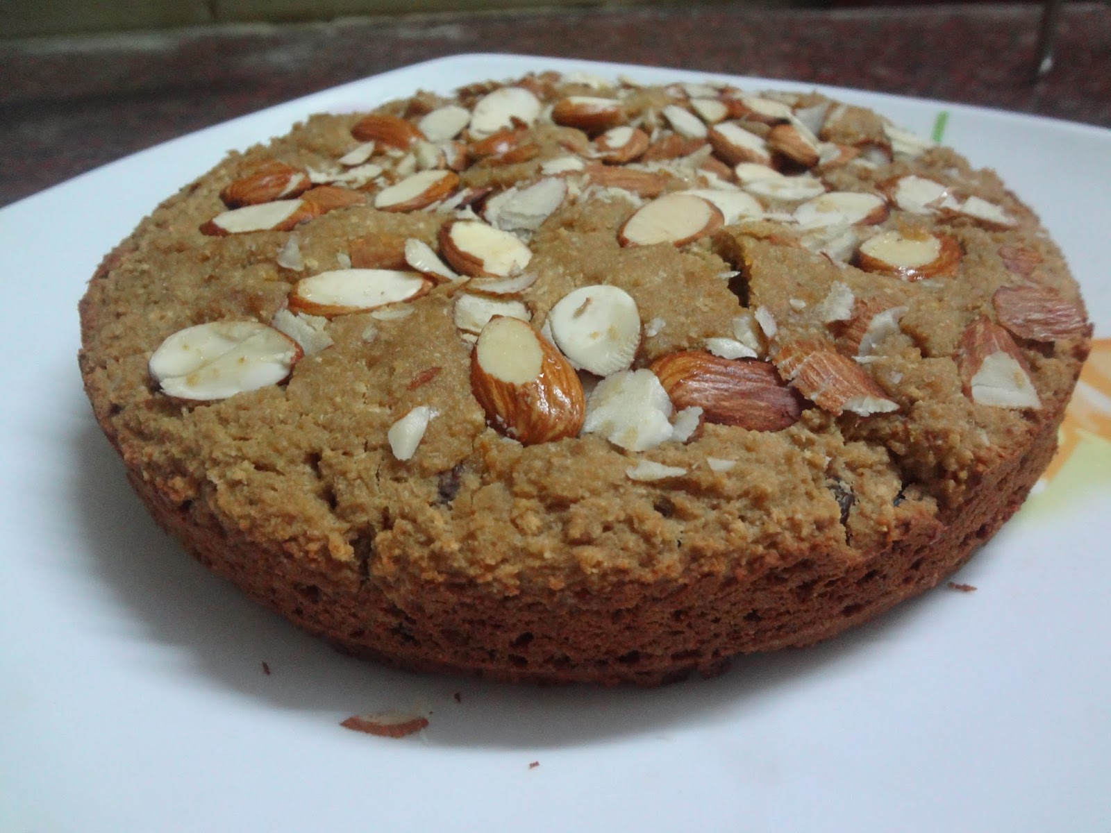 WHOLEWHEAT OATMEAL FLOUR ALMOND RAISIN CAKE ( EGGLESS )