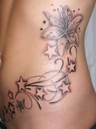 Brownish 3D star tattoo on side body