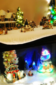 The old fish tank... which stands in the dinning room for most of the year looking like a heap of, well, old fish tank, and is magically (with the help of 4 rolls of cotton wool and a ton of fake snowflakes) transformed into Littlie's winter-wonderland each Christmas.