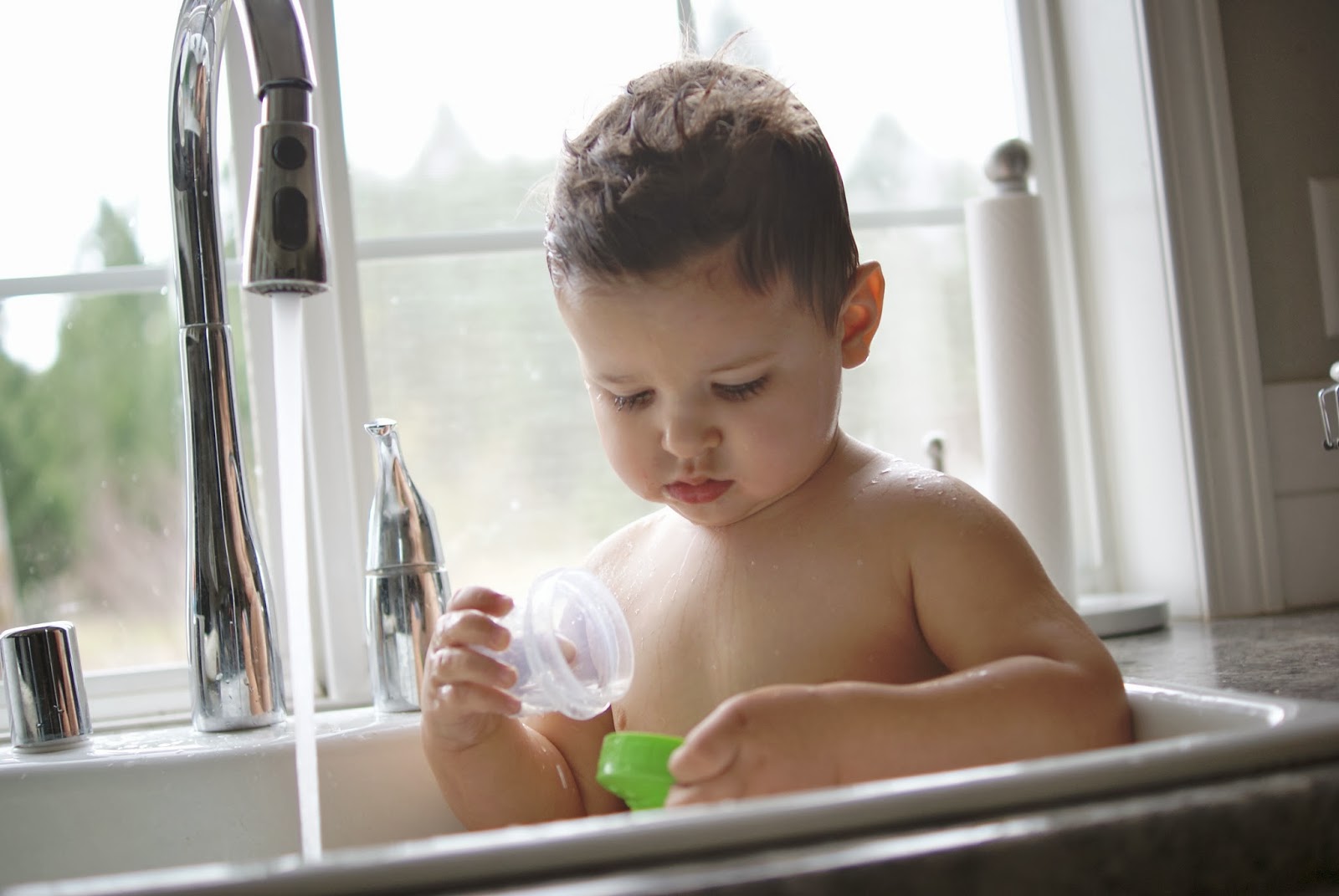 Three Men & One Lady. Sink Bath for a Sick Baby.