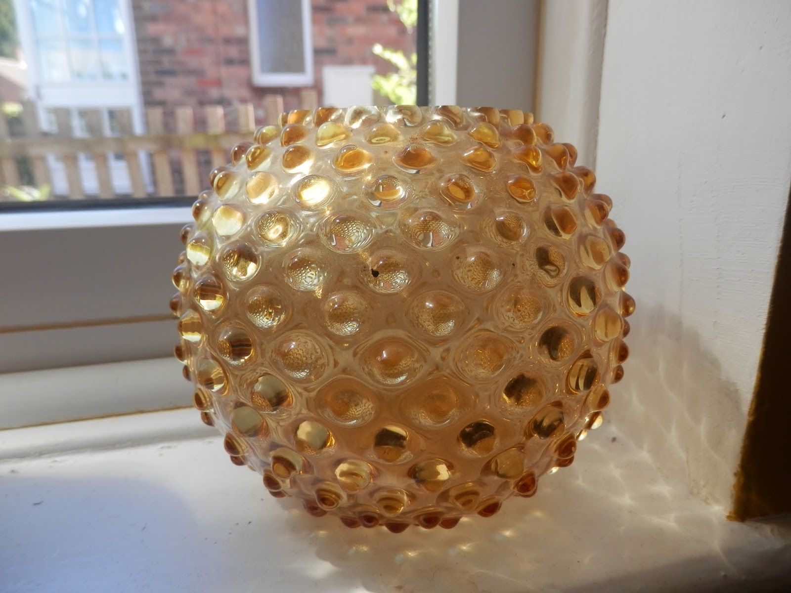 Second Hand Susie Charity Shopping The Man Edition. Glass Paperweights.