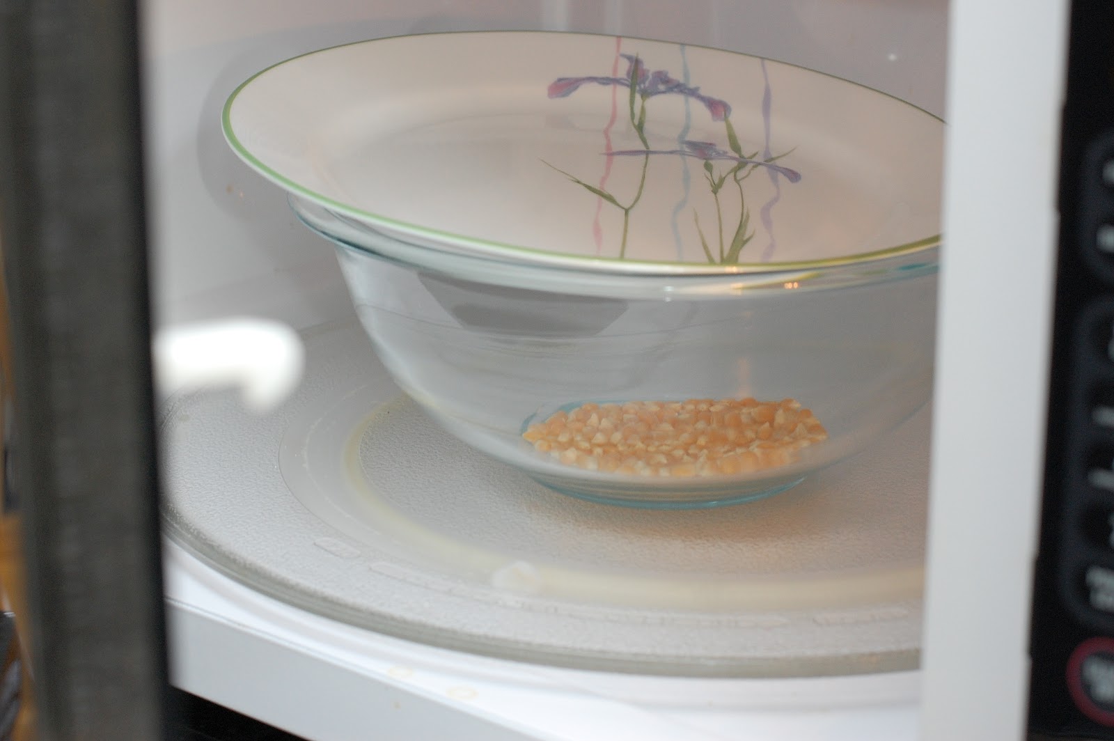 In Michelle's Kitchen Microwave Popcorn in a Glass Bowl