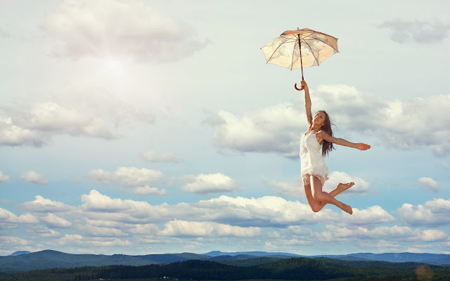 Girl Flying With Umbrella