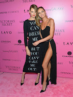 Candice Swanepoel shows off her leg in a high cut dress