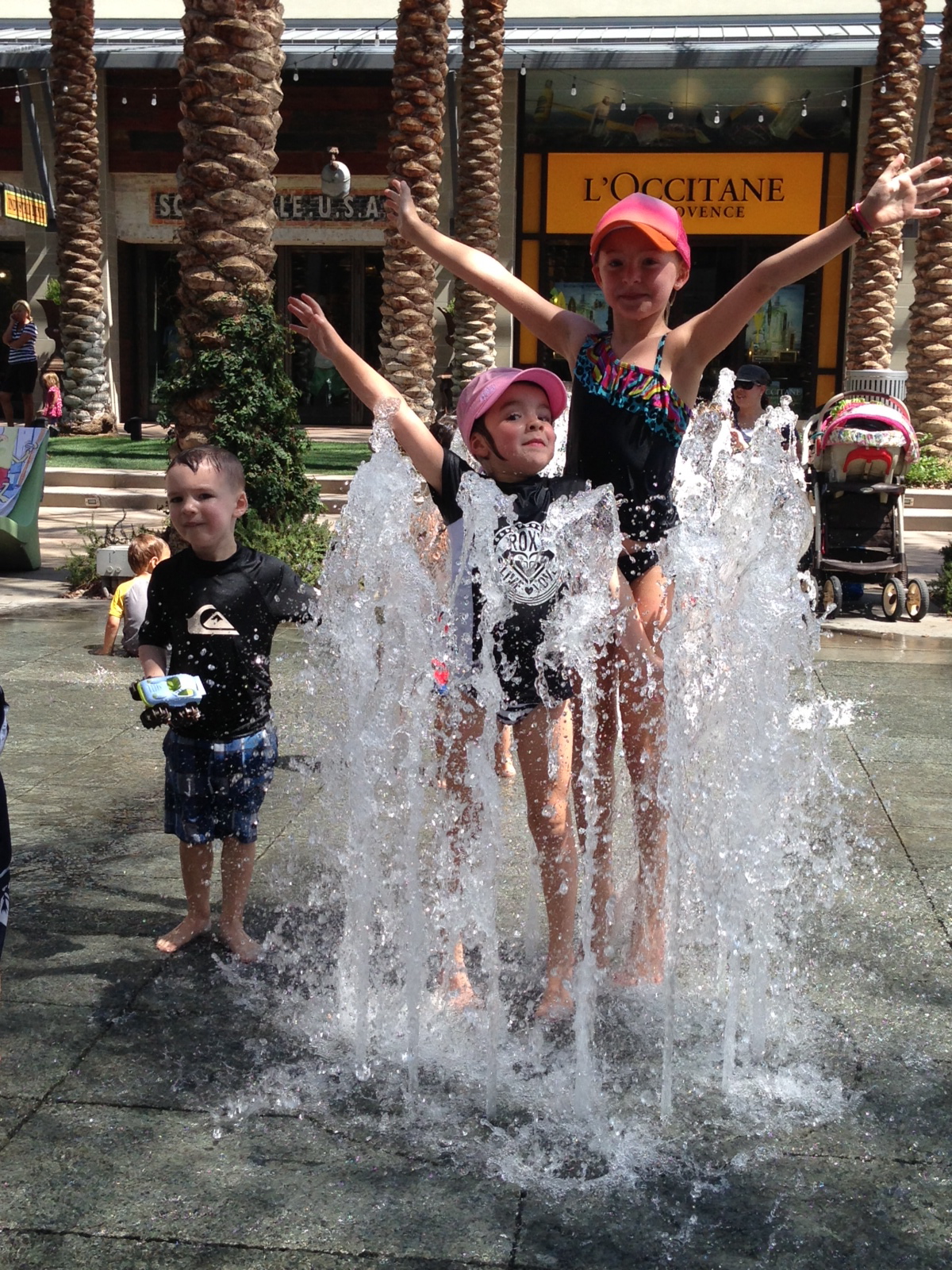 Love Always, Paola SCOTTSDALE QUARTER SPLASH PAD