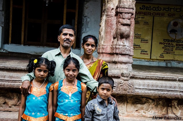 three smiling kids at Hampi temple