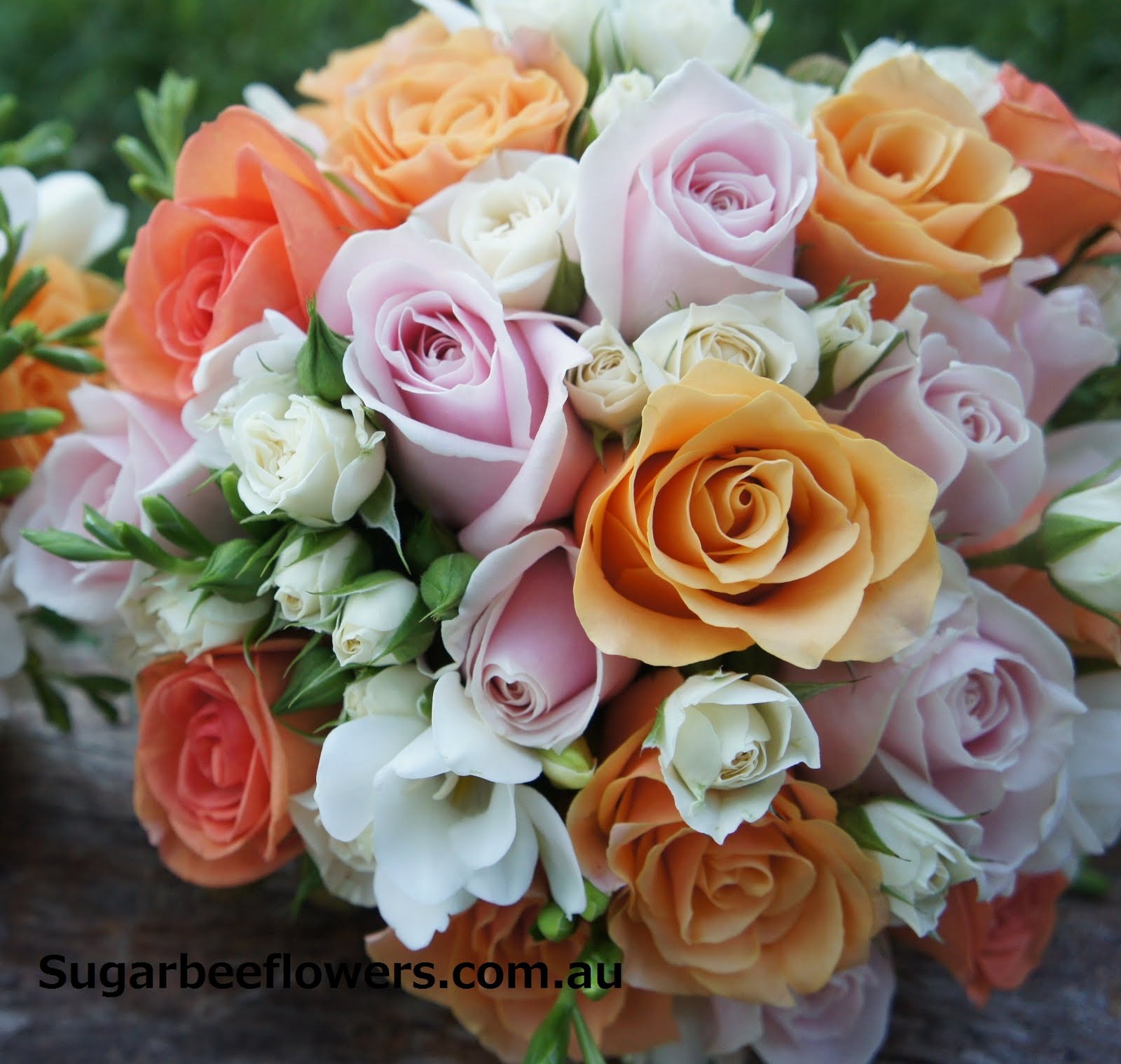 Sugar Bee Flowers Orange, pink & white wedding flowers