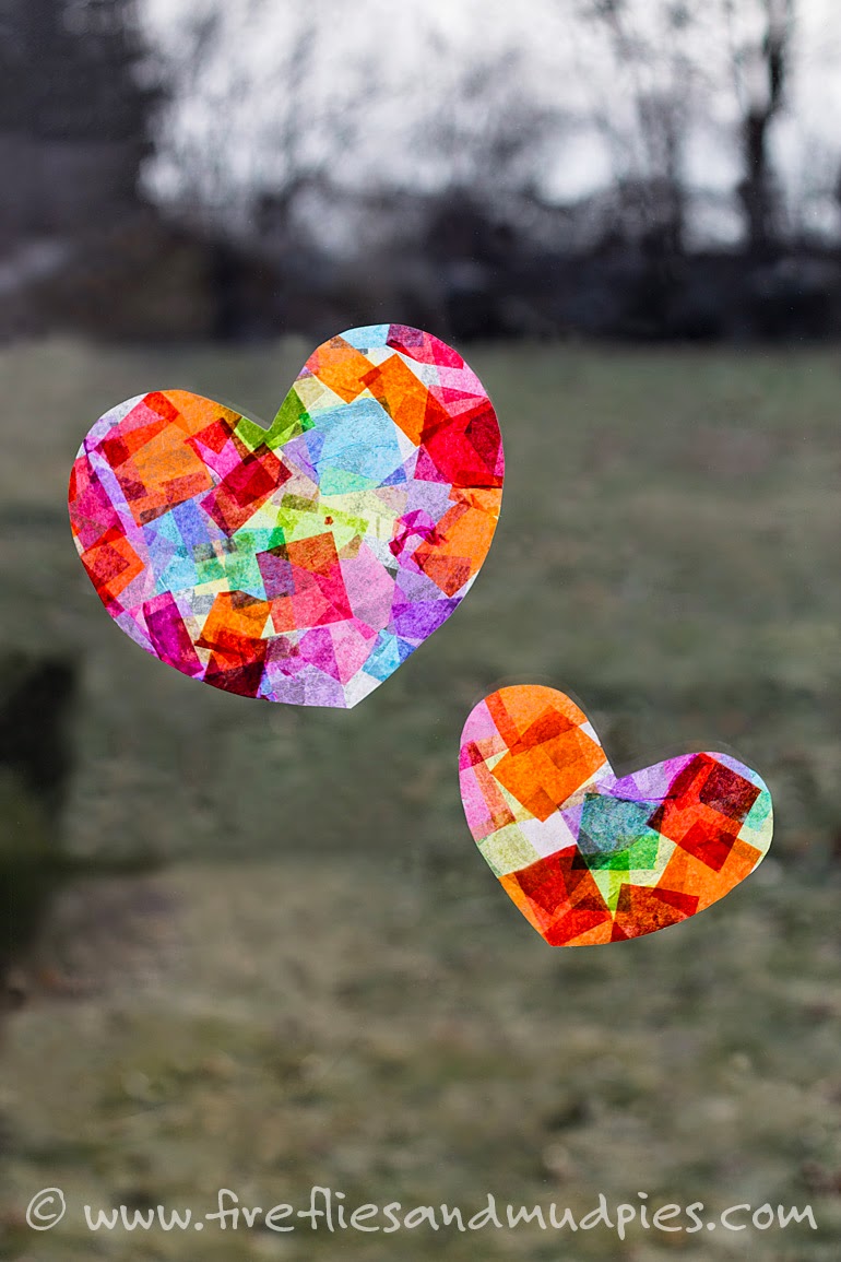 http://www.firefliesandmudpies.com/2015/01/06/rainbow-heart-suncatchers/