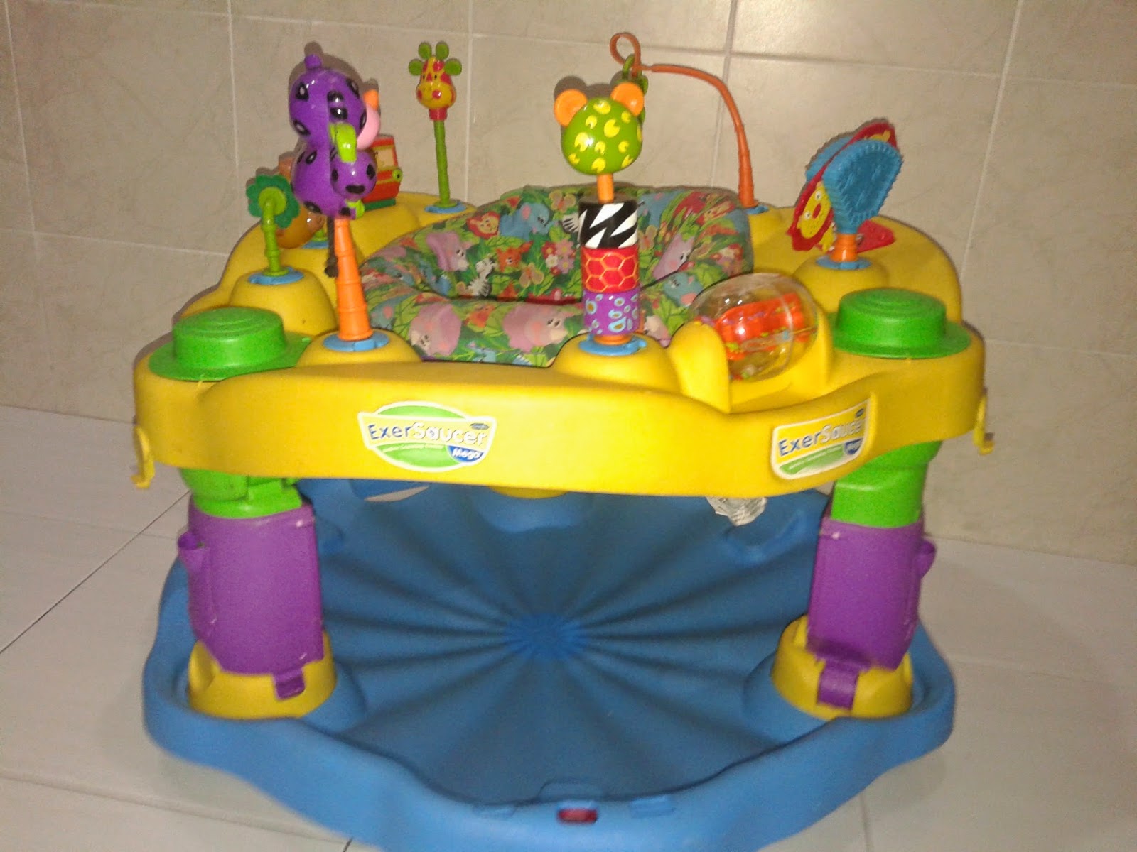 foldable exersaucer