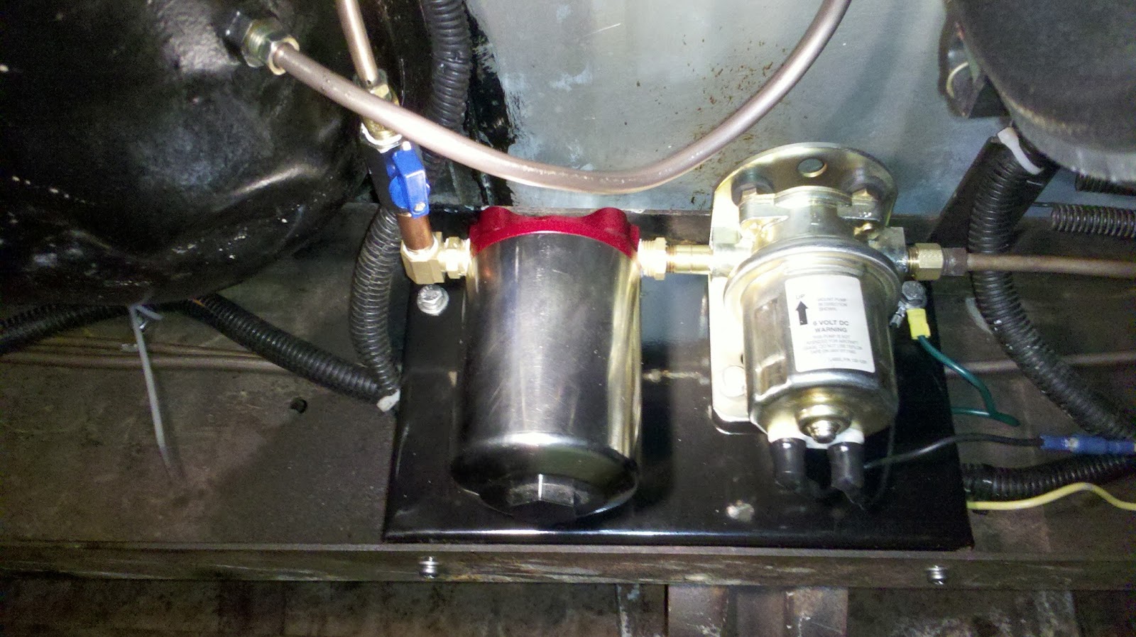 Here we have the manual fuel cut-off valve, fuel filter and fuel pump. I made a mounting plate that attaches to the frame on the bottom and back.