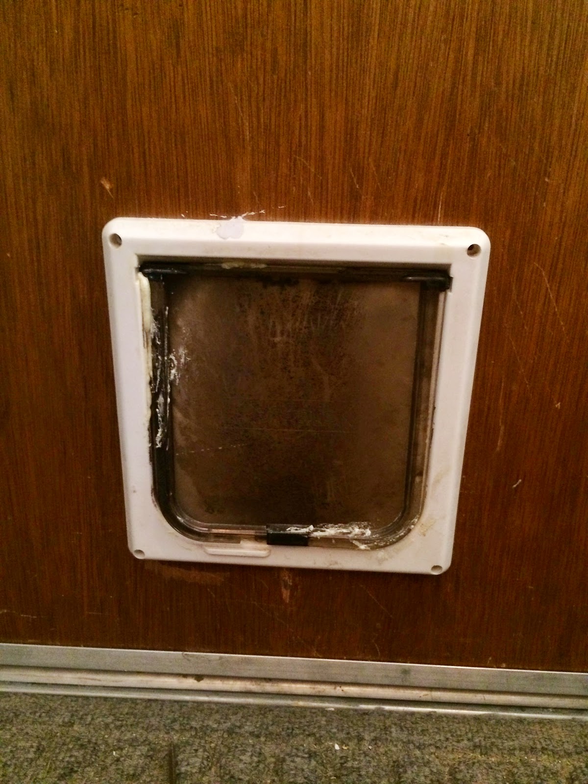 The Burrow Ugly door makeover how to cover a doggie door