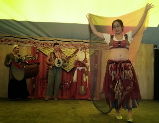 Orluk drummers and dancer at the middle eastern dance expo drumming and dancing onstage