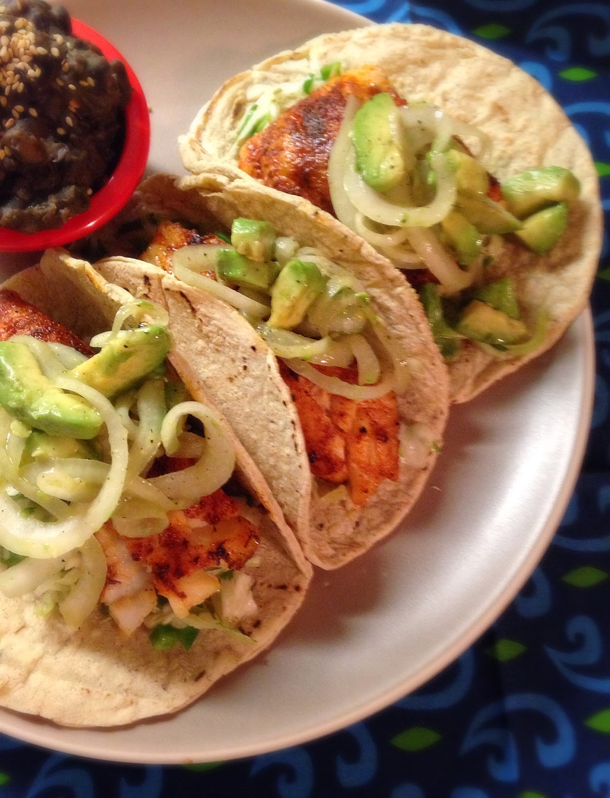 What We Cook Blackened Cod Tacos with jalapeño slaw, avocado salad and