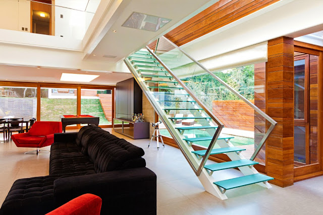 Picture of glass staircase leading from the living room to the upper floor
