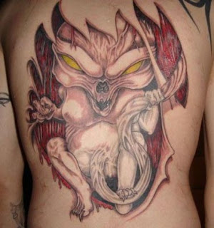 demon tattoo on the back
