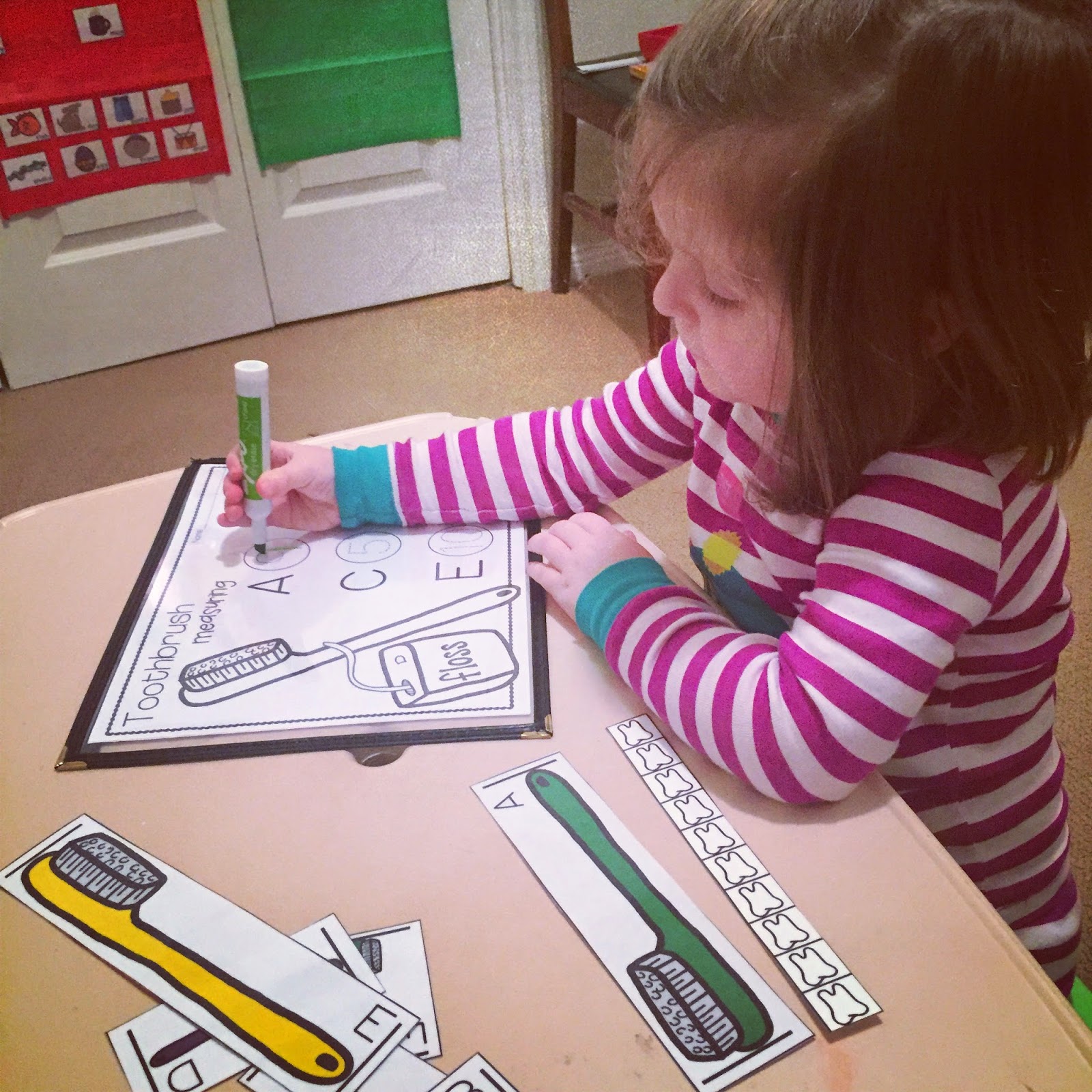 Giggles and Glue sticks....sisters learning together.