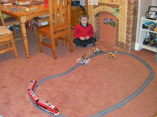lego electric train track with level crossing and platform