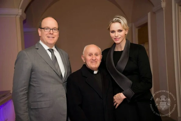 Prince Albert and Princess Charlene stepped out on the balcony to take part in this Holy Week tradition.