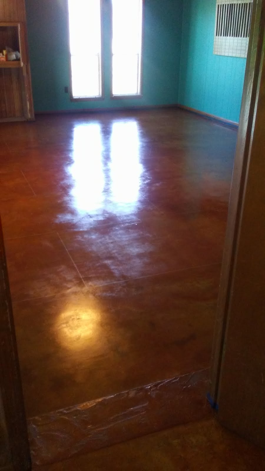 Concrete resurfaced, stained, and sealed