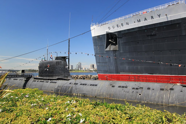 USS Scorpion Submarine is parked next to the legendary Queen Mary's cruise ship at Long Beach, Los Angeles, California, USA USS Scorpion Submarine is parked next to the legendary Queen Mary's cruise ship at Long Beach, Los Angeles, California, USA