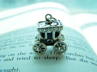 silver pendant,carriage,jewelry,sculpture