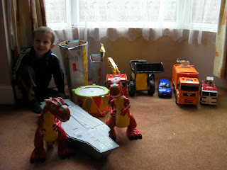 outsize toys, vehicles, dinosaurs, drum and aircraft carrier