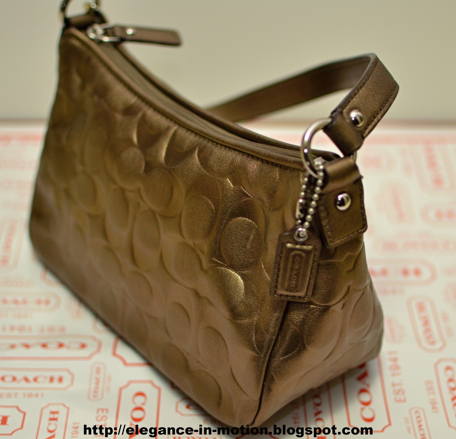 Elegance in Motion Coach Bronze Embossed Leather Purse Small Bag