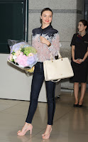 Miranda Kerr posing for cameras at Incheon International Airport