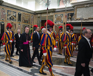  US President Barack Obama on his way to an audience with Pope Francis in 2014, with a Swiss Guard escort