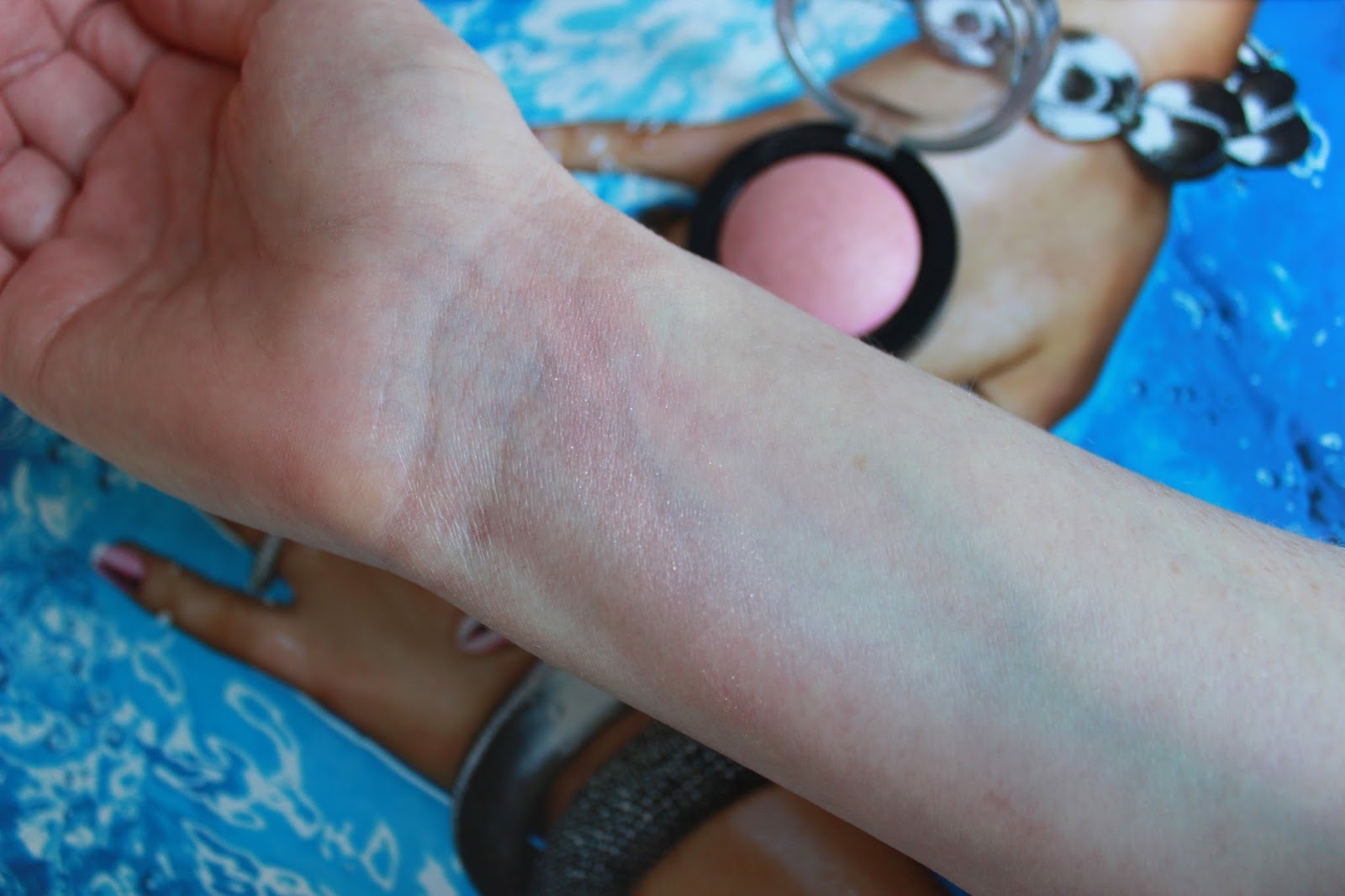 Max Factor Creme Puff blusher swatch in Lovely Pink