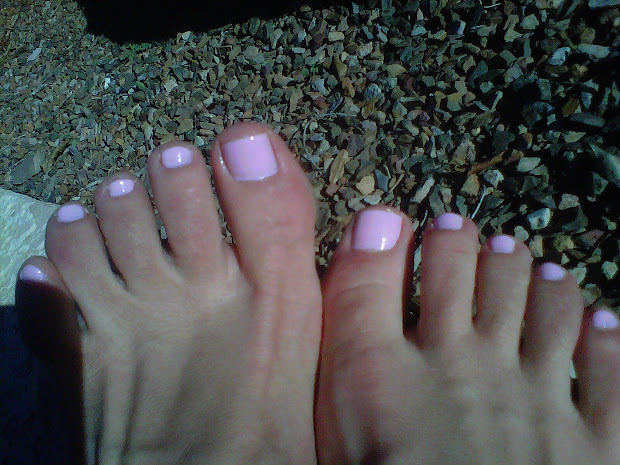 racing in painted toenails