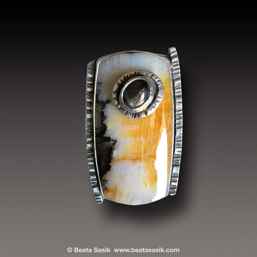 http://beatasasik.indiemade.com/product/opalized-wood-sterling-silver-ring-black-sapphire-b-sasik