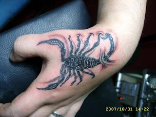Realistic scorpion tattoo; wrist tattoo, hand tattoo