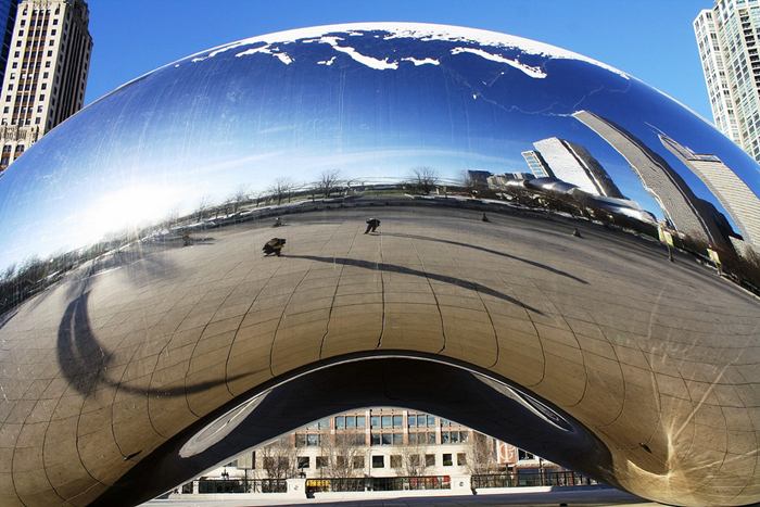 Cloud Gate, a public sculpture is the centerpiece of the AT&T Plaza in Millennium Park within the Loop community area of Chicago, Illinois, United States. The sculpture is nicknamed "The Bean" because of its bean-like shape. Made up of 168 stainless steel plates welded together, its highly polished exterior has no visible seams. 