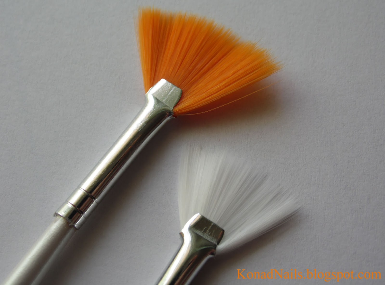 Konad Addict Striped nail art using fan brush