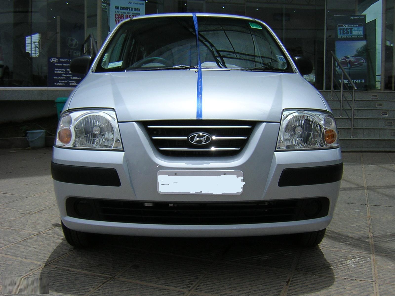 http://1.bp.blogspot.com/-dH07RdP4rR4/UXd91xJxucI/AAAAAAAABEY/3l_PhWW9O2Y/s1600/Hyundai-Santro-Xing-front.jpg