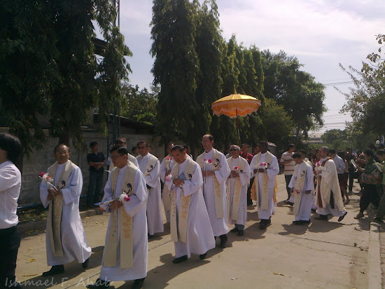 Priests joining the procession for the Solemnity of Mother of God in Rangsit.