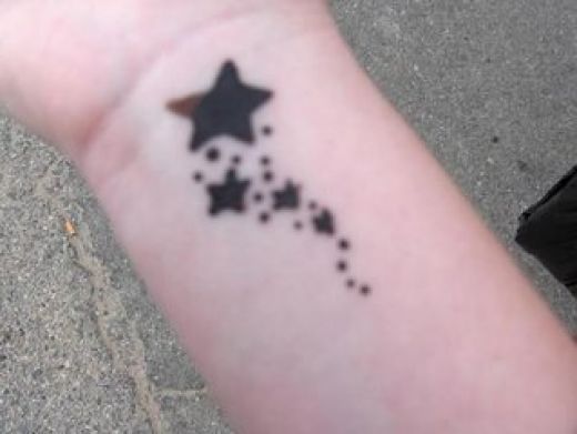Shooting Star Tattoos On Wrist