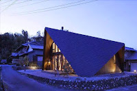 Origami House Design with A-Frame in an Old Village Surrounded by Mountains Origami House Design with A-Frame in an Old Village Surrounded by Mountains