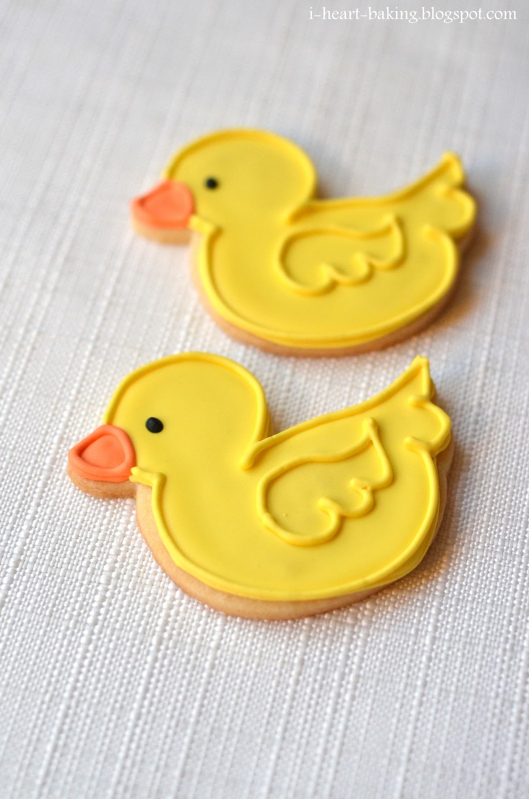 i heart baking! baby shower duckie and onesie cookies